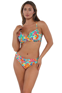 Active pose #2 of Taylor wearing Sunsets Festive Floral Sandbar Rib Crossroads Underwire Top