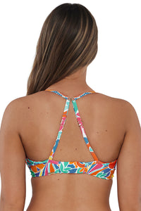 Back pose #1 of Taylor wearing Sunsets Festive Floral Sandbar Rib Crossroads Underwire Top showing crossback straps