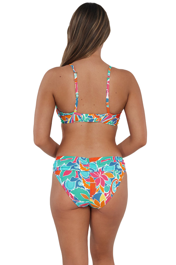 Back pose #1 of Taylor wearing Sunsets Festive Floral Sandbar Rib Unforgettable Bottom paired with matching