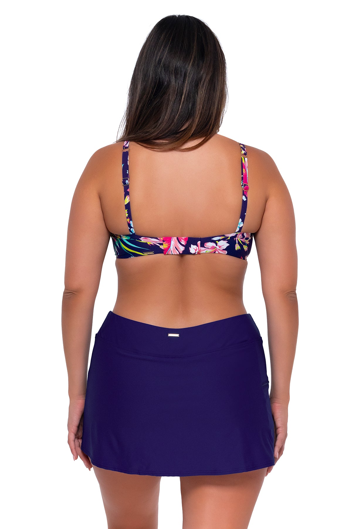 Back pose #1 of Nicky wearing Sunsets Island Getaway Crossroads Underwire Top with matching Sporty Swim Skirt