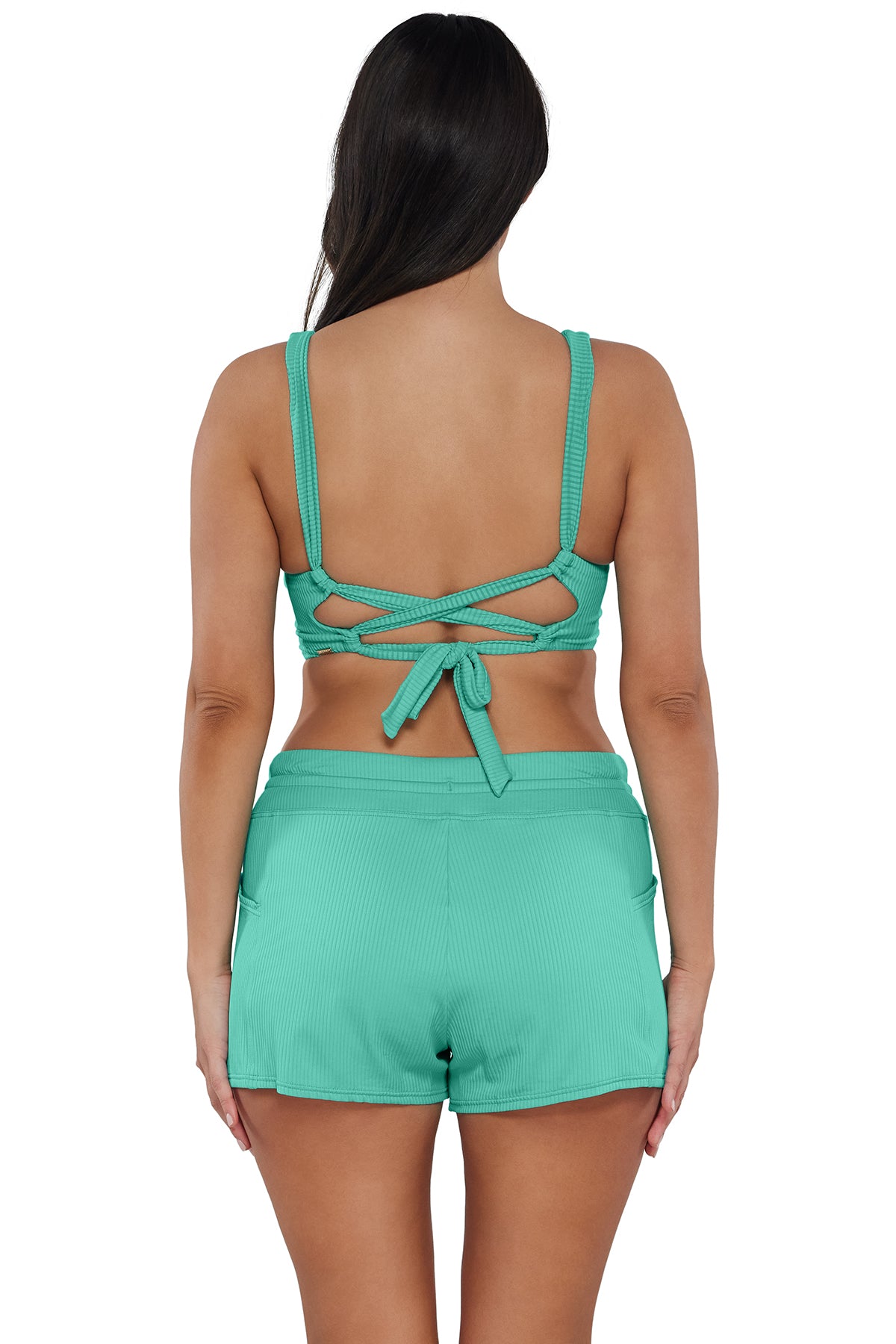 Back pose #1 of Nicki wearing Sunsets Aqua Mist Sandbar Rib Elsie Top