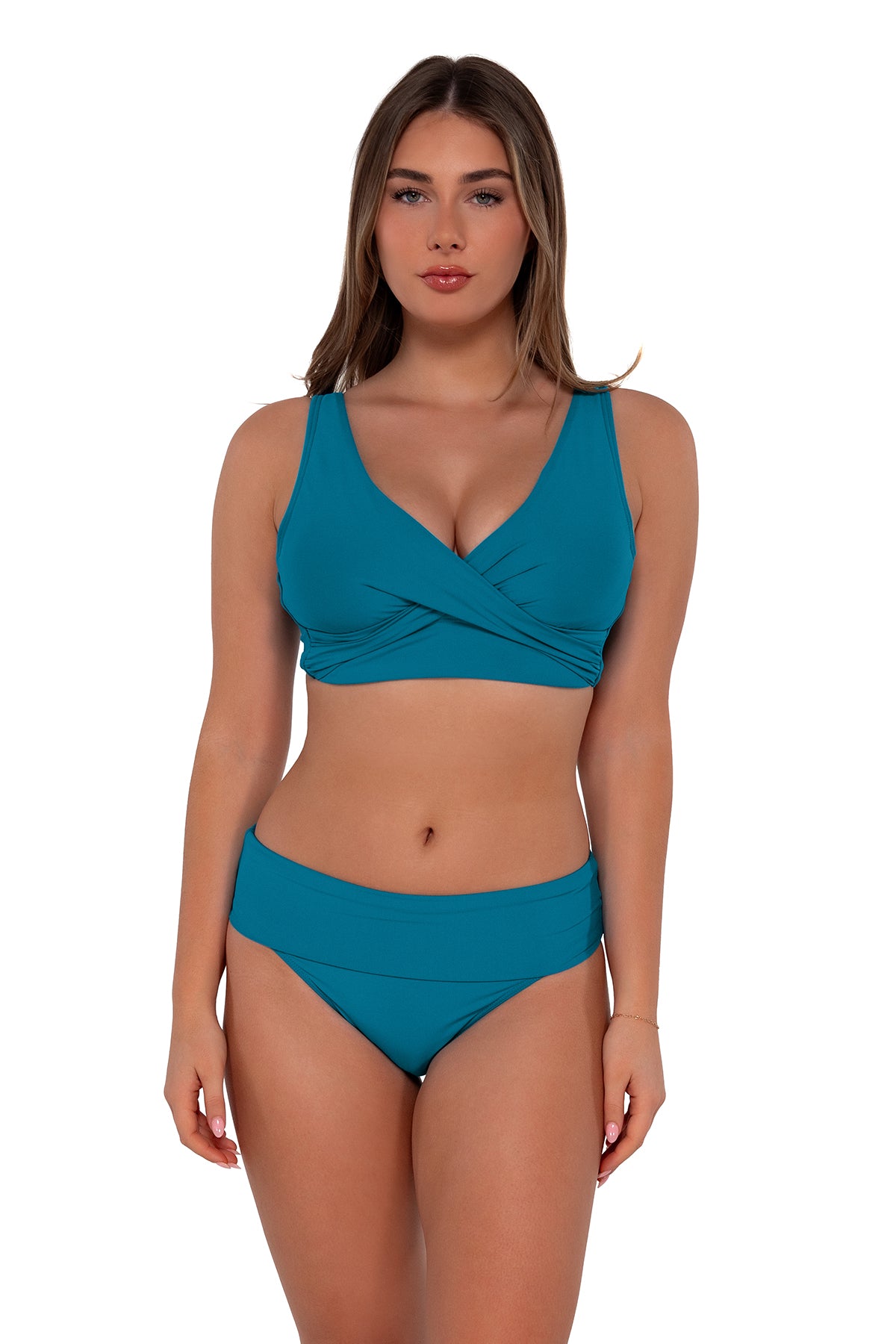 Front pose #2 of Taylor wearing Sunsets Avalon Teal Hannah High Waist Bottom showing folded waist paired with Elsie Top bikini bralette