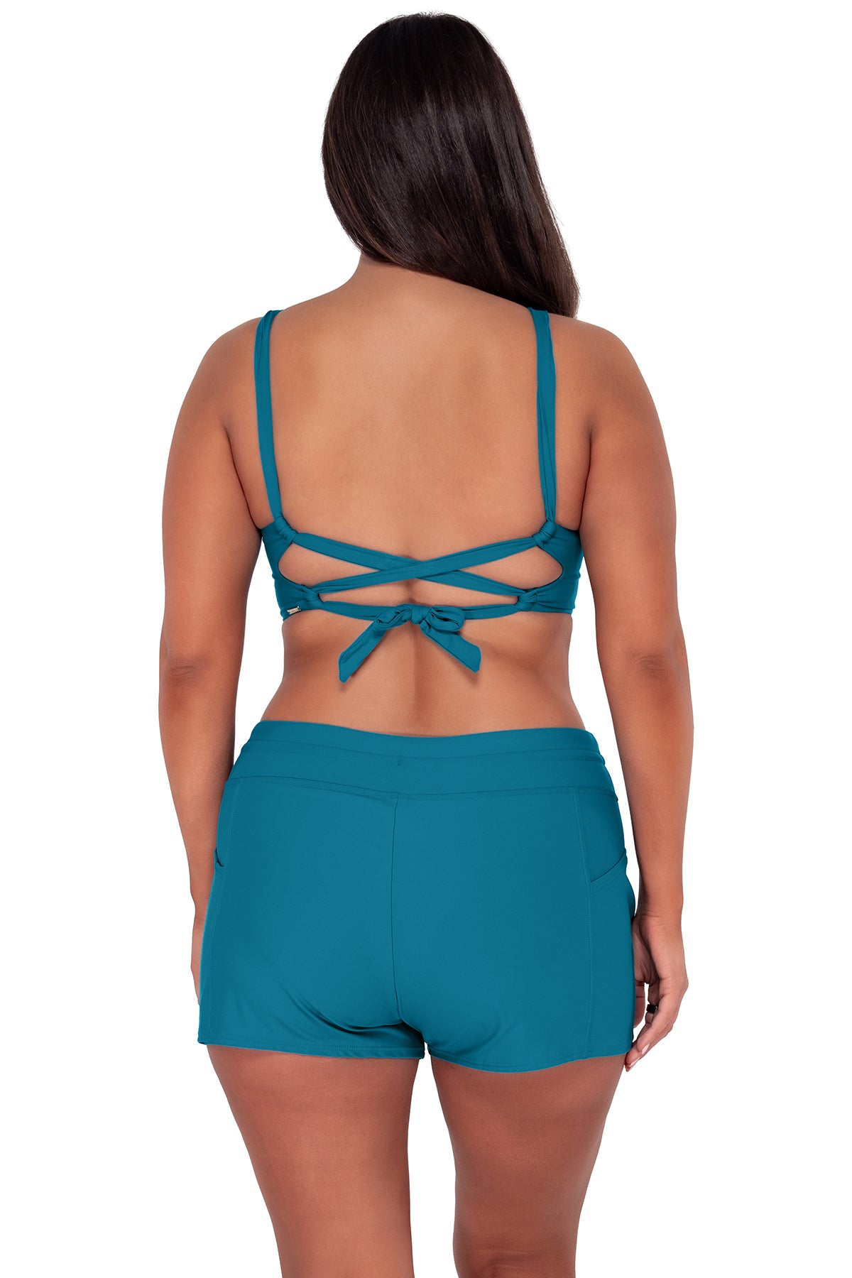 Back pose #1 of Nicki wearing Sunsets Avalon Teal Elsie Top paired with Laguna Swim Short women's casual wear