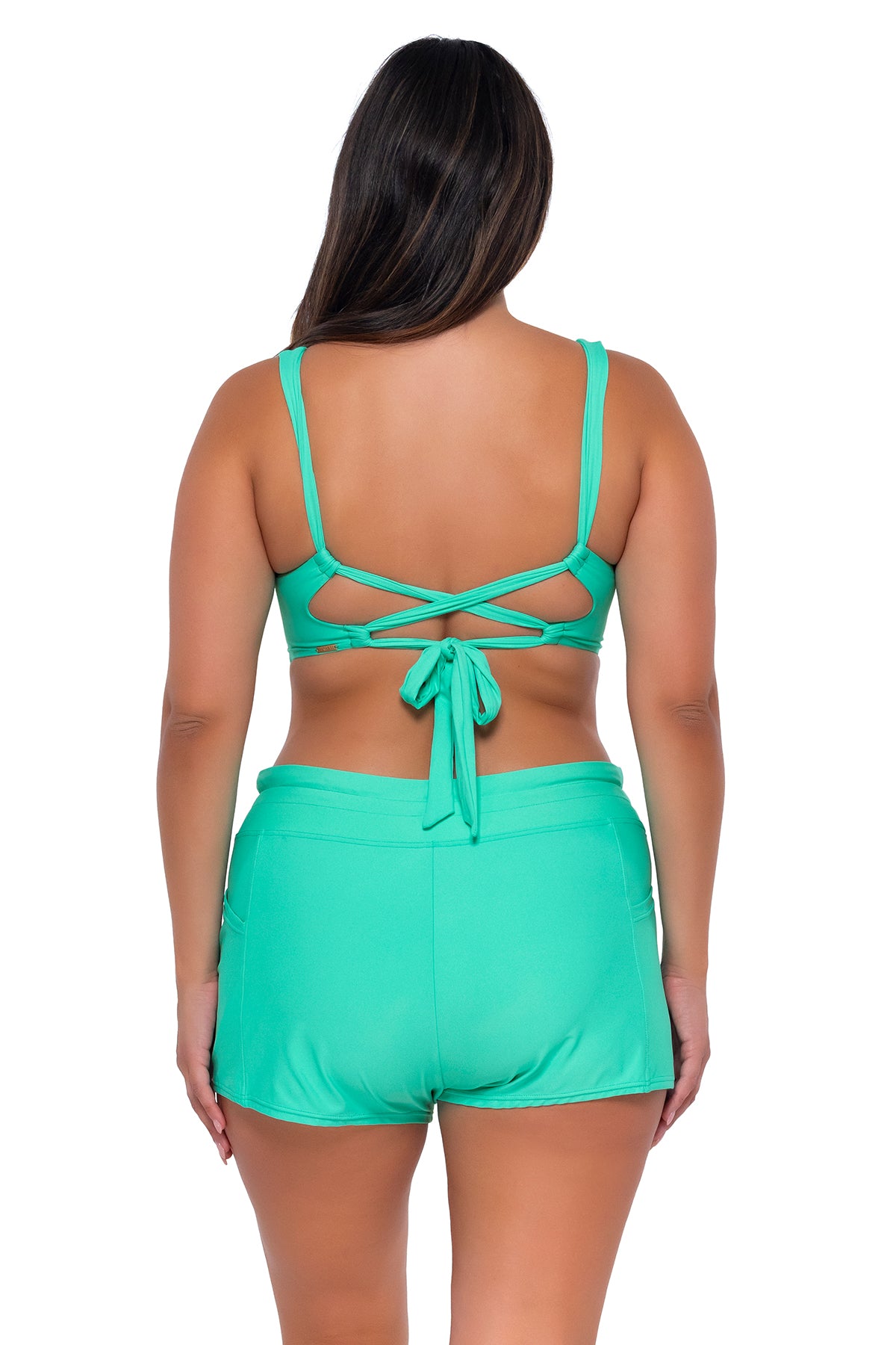 Back pose #1 of Nicky wearing Sunsets Mint Elsie Top with matching Laguna Swim Short