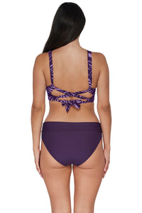 Back pose #1 of Nicki wearing Sunsets Mystic Palms Elsie Top paired with coordinating Paradise Plum Hannah High Waist Bottom