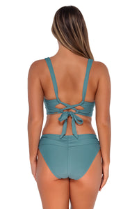 Back pose #1 of Taylor wearing Sunsets Ocean Elsie Top with matching Unforgettable Bottom bikini