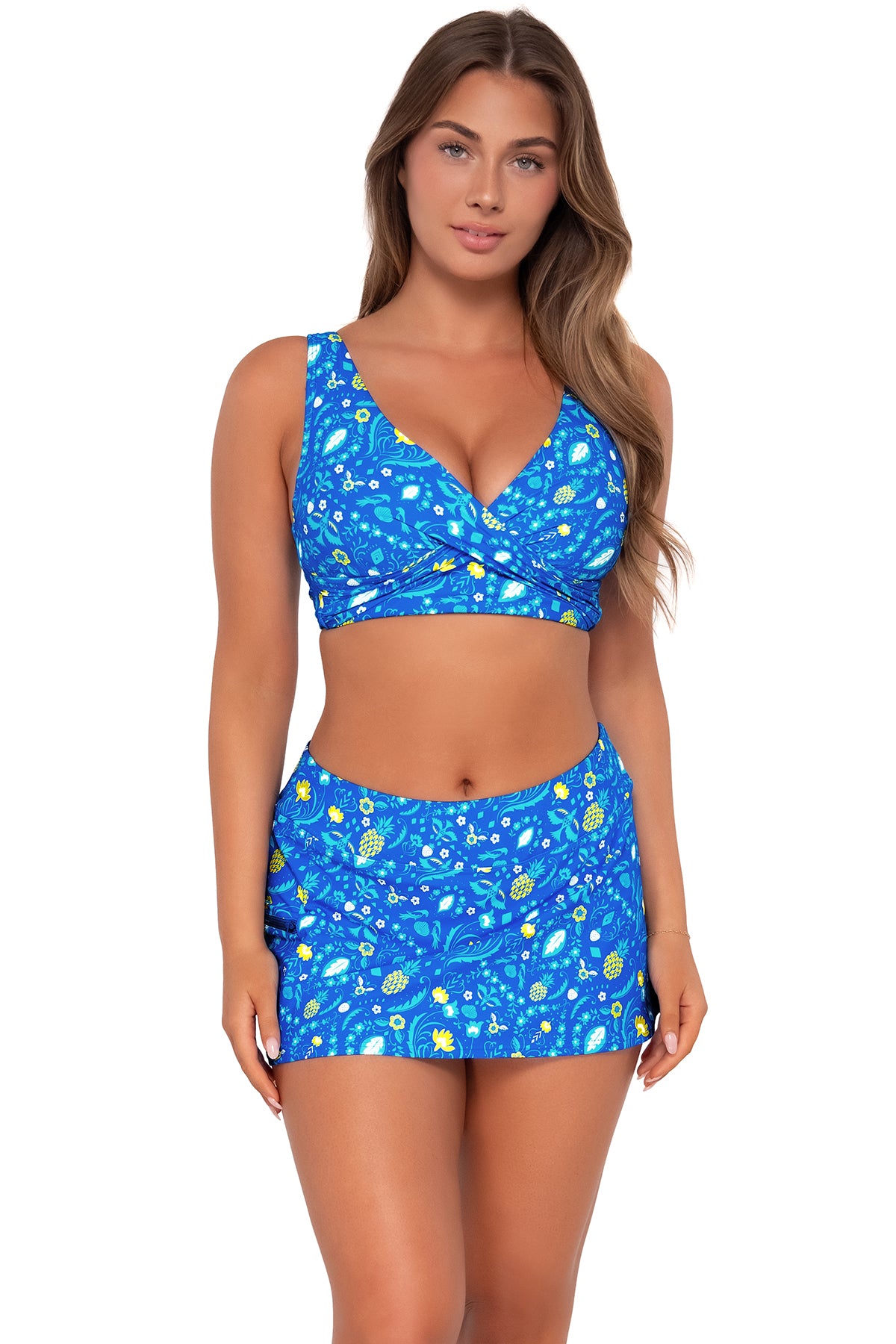 Front pose #1 of Taylor wearing Sunsets Pineapple Grove Sporty Swim Skirt with matching Elsie Top bikini bralette