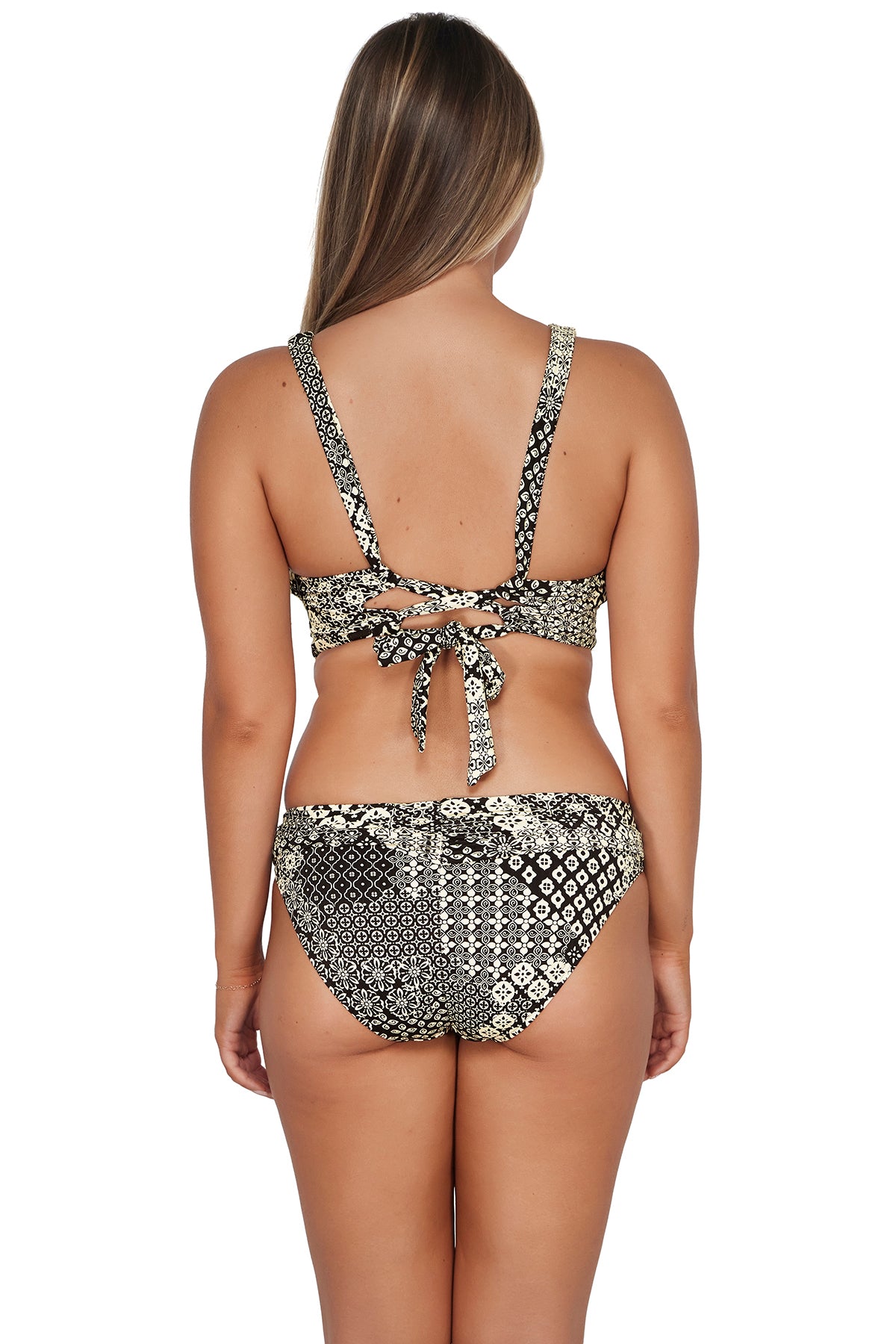 Back pose #1 of Taylor wearing Sunsets Venice Seagrass Texture Elsie Top paired with matching Unforgettable Bottom