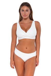 Front pose #1 of Taylor wearing Sunsets White Lily Hannah High Waist Bottom showing folded waist with matching Elsie Top underwire bikini