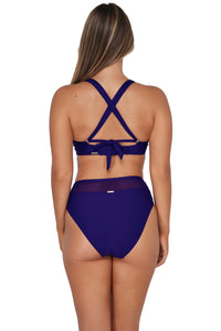 Back pose #1 of Taylor wearing Sunsets Indigo Vienna V-Wire Top showing crossback straps