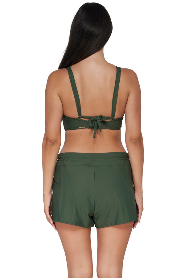 Back pose #1 of Nicki wearing Sunsets Escape Island Green Laguna Swim Short Bottom paired with matching Elsie Top