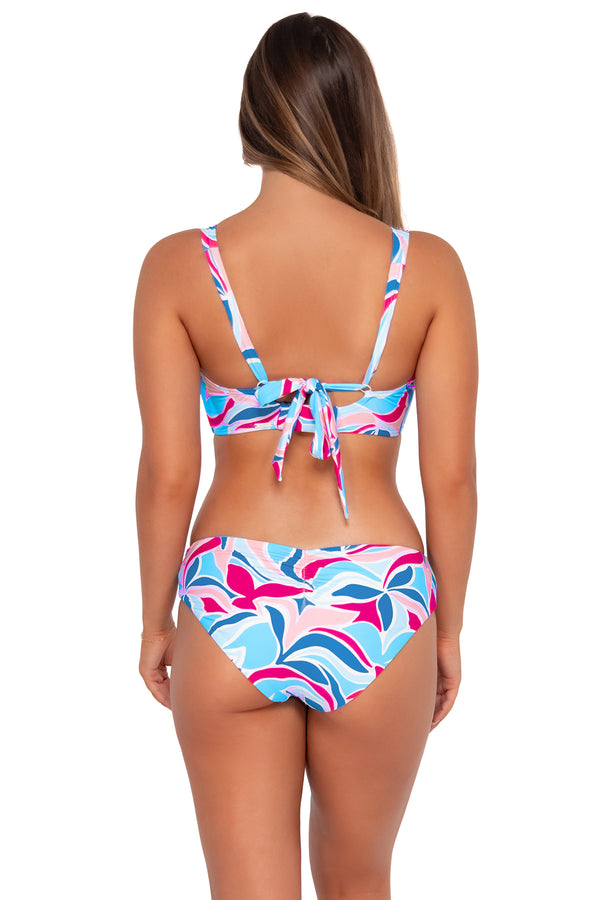 Back pose #1 of Taylor wearing Sunsets Making Waves Alana Reversible Hipster Bottom with matching Vienna V-Wire bikini top