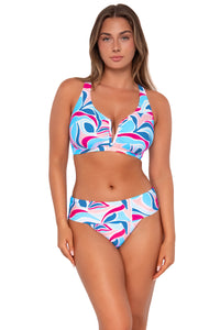 Front pose #1 of Taylor wearing Sunsets Making Waves Hannah High Waist Bottom showing folded waist with matching Vienna V-Wire bikini top