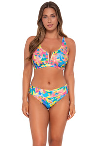 Front pose #1 of Taylor wearing Sunsets Shoreline Petals Hannah High Waist Bottom showing folded waist with matching Vienna V-Wire bikini top