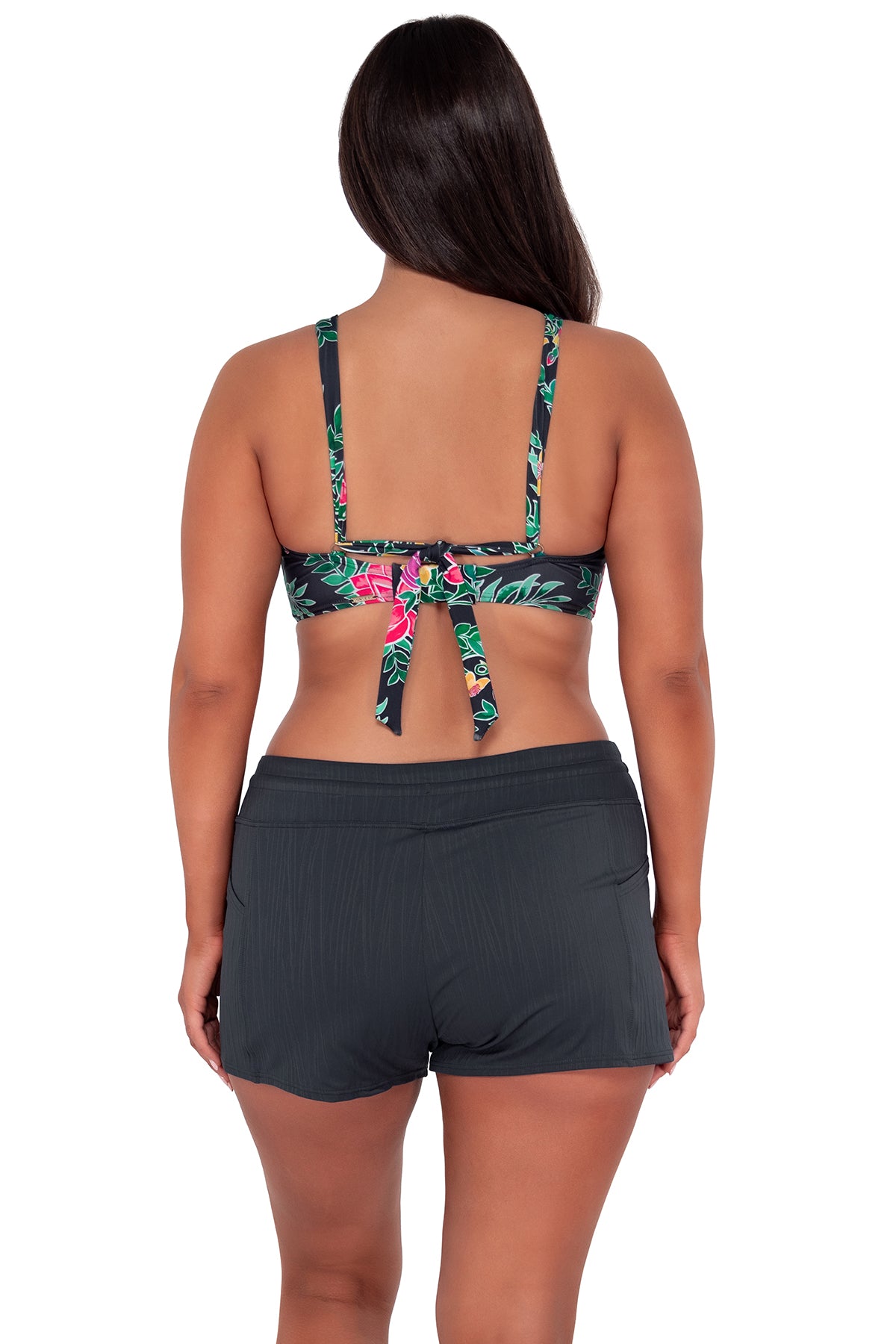 Back pose #1 of Nicki wearing Sunsets Twilight Blooms Vienna V-Wire Top paired with Laguna Swim Short women's casual wear