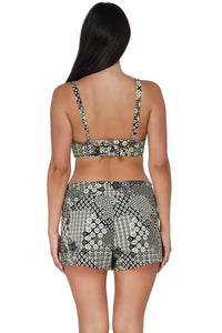 Back pose #1 of Nicki wearing Sunsets Escape Venice Seagrass Texture Laguna Swim Short Bottom