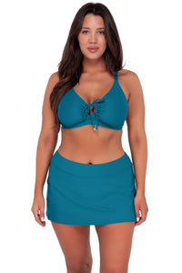 Front pose #1 of Nicki wearing Sunsets Avalon Teal Kauai Keyhole Top paired with Sporty Swim Skirt swim bottom