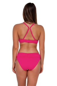 Back pose #1 of Taylor wearing Sunsets Begonia Sandbar Rib Kauai Keyhole Top showing crossback straps paired with Unforgettable Bottom swim hipster