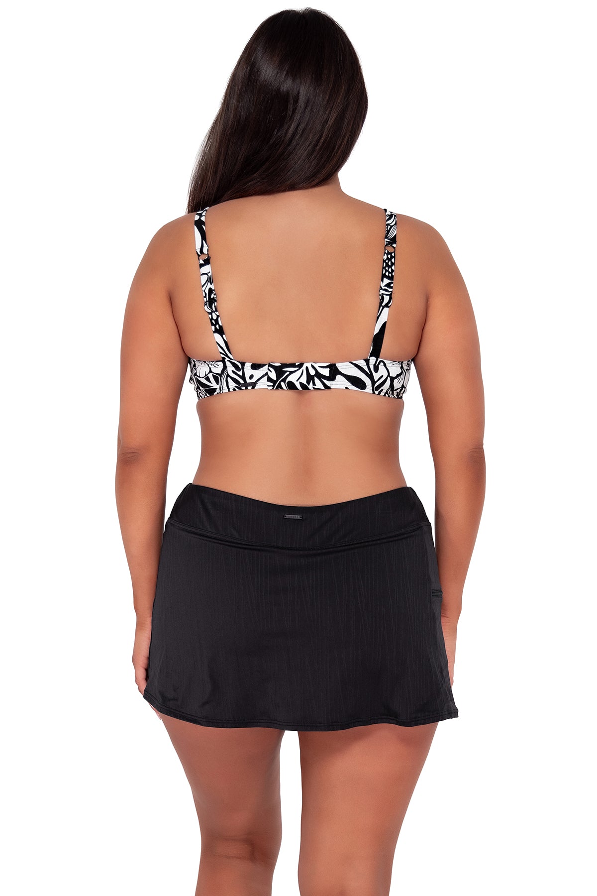 Back pose #1 of Nicki wearing Sunsets Caribbean Seagrass Texture Kauai Keyhole Top paired with Sporty Swim Skirt swim bottom