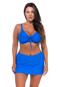 Front pose #1 of Nicky wearing Sunsets Electric Blue Sporty Swim Skirt with matching Kauai Keyhole bikini top