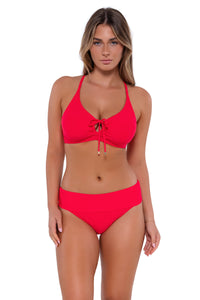 Front pose #1 of Taylor wearing Sunsets Geranium Hannah High Waist Bottom showing folded waist with matching Kauai Keyhole bikini top