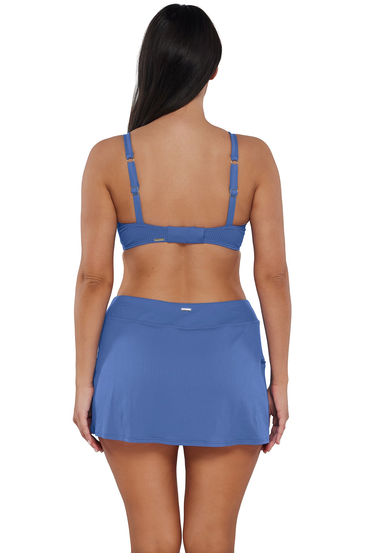 Back pose #1 of Nicki wearing Sunsets Harbor Blue Sandbar Rib Sporty Swim Skirt paired with matching