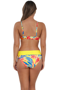 Back pose #1 of Taylor wearing Sunsets Suncatcher Kauai Keyhole Top paired with matching Capri High Waist Bottom