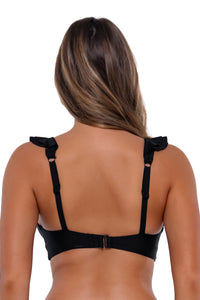 Back pose #1 of Taylor wearing Sunsets Black Willa Wireless Top