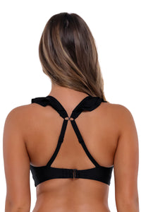Back pose #1 of Taylor wearing Sunsets Black Willa Wireless Top showing crossback straps