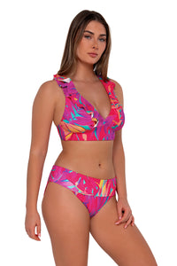 Side pose #1 of Taylor wearing Sunsets Oasis Sandbar Rib Hannah High Waist Bottom showing folded waist paired with Willa Wireless bikini top