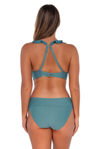 Back pose #1 of Taylor wearing Sunsets Ocean Willa Wireless Top showing crossback straps with matching Hannah High Waist bikini bottom showing folded waist
