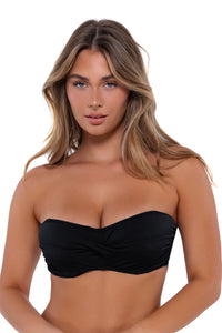 Front pose #1 of Taylor wearing Sunsets Black Iconic Twist Bandeau Top as a strapless bikini