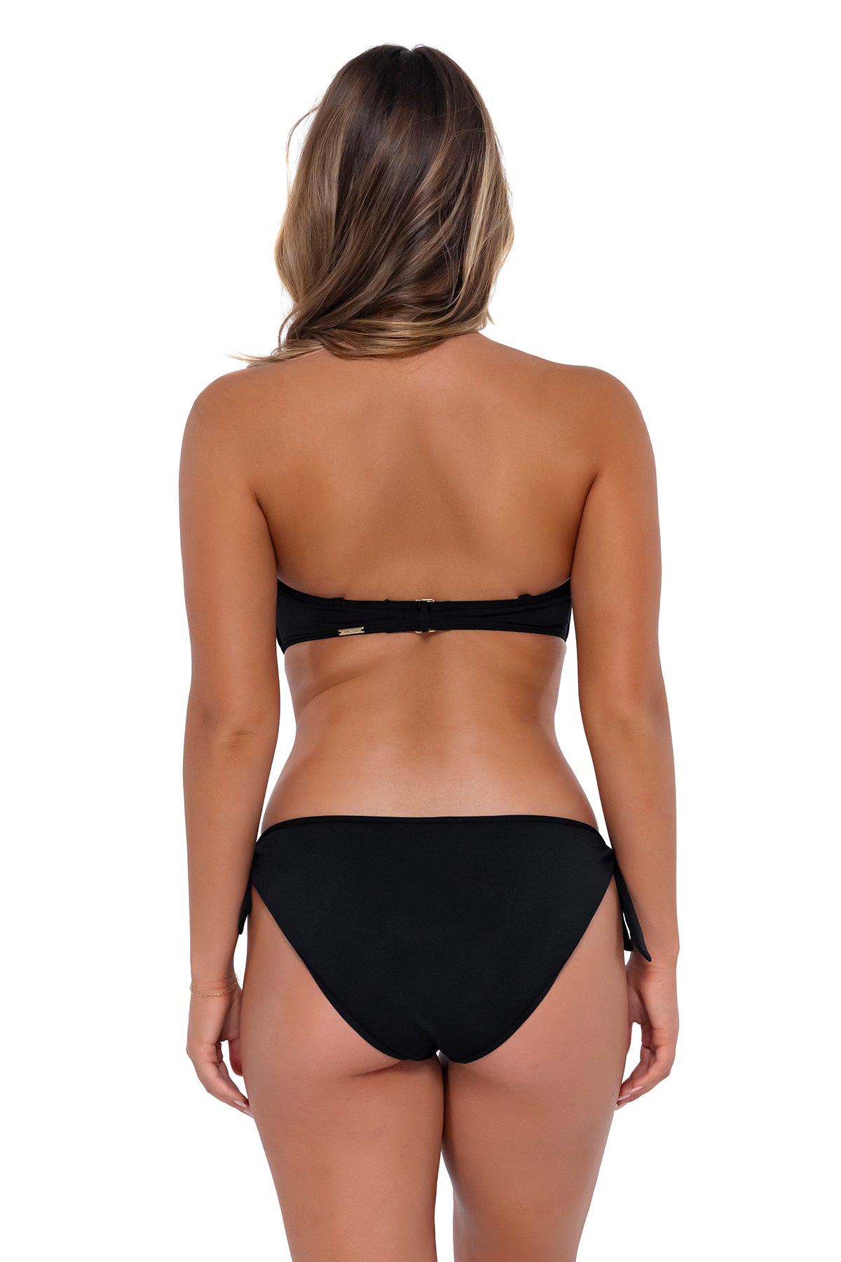Back pose #1 of Taylor wearing Sunsets Black Lula Reversible Hipster Bottom with side ties and matching Iconic Twist Bandeau worn as a strapless bikini