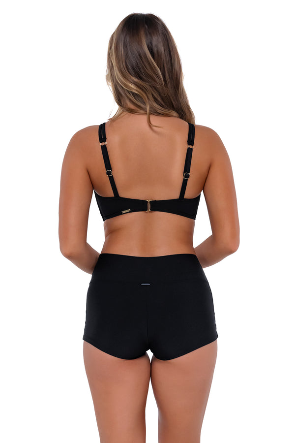 Back pose #1 of Taylor wearing Sunsets Black Taylor Bralette Top with matching Kinsley Swim Short