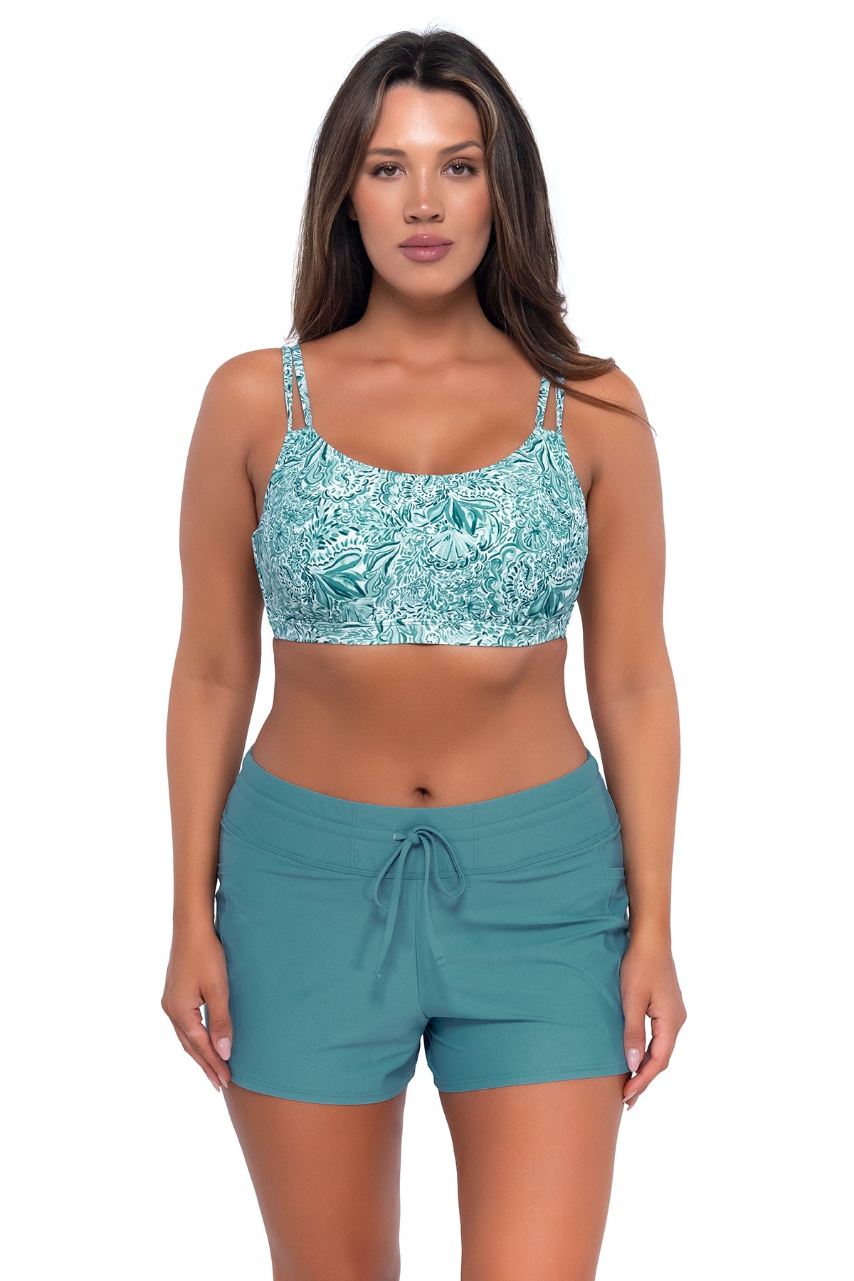 Front pose #1 of Nicky wearing Sunsets By the Sea Taylor Bralette Top paired with Laguna Swim Short women's casual wear
