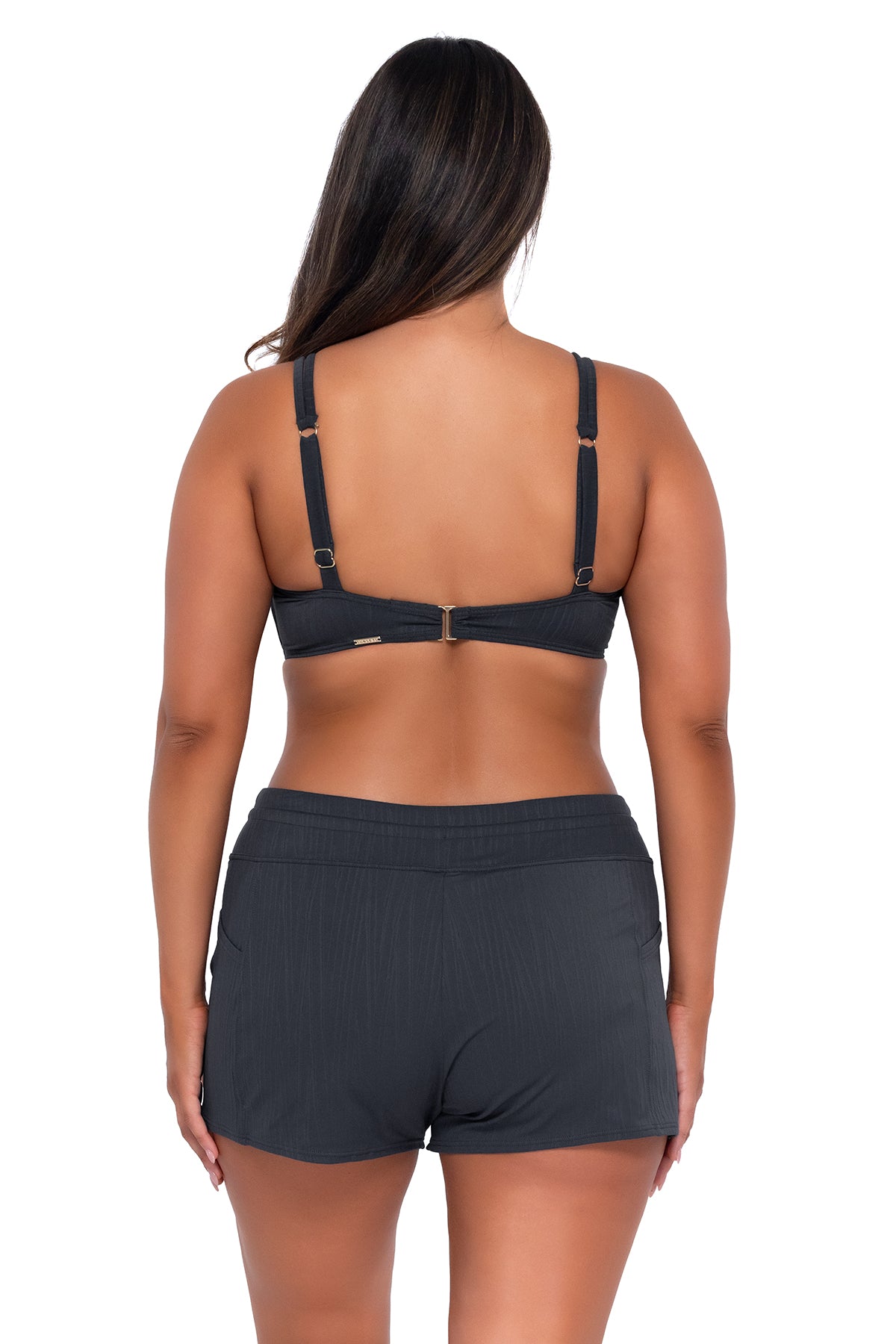 Back pose #1 of Nicky wearing Sunsets Slate Seagrass Texture Taylor Bralette Top with matching Laguna Swim Short