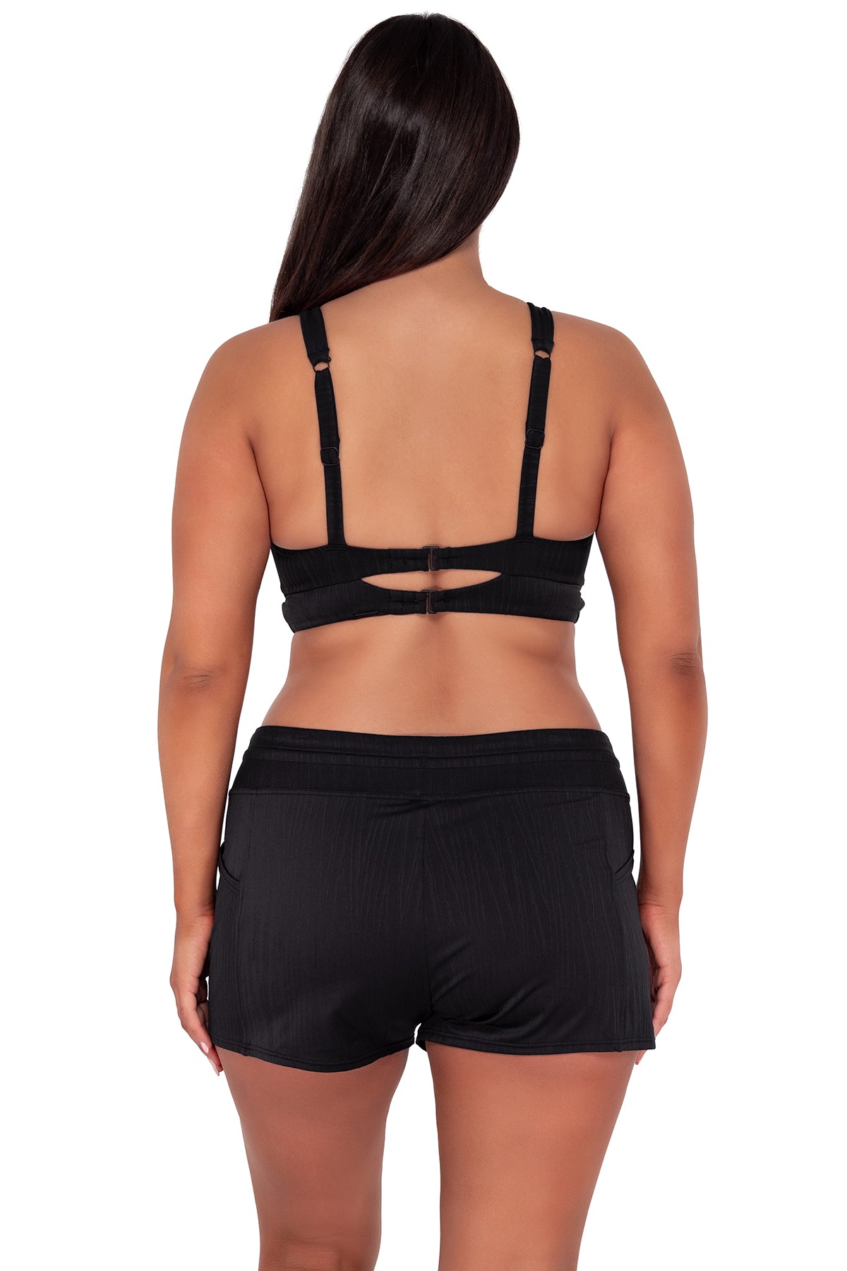 Back pose #1 of Nicki wearing Sunsets Black Seagrass Texture Danica Top paired with Laguna Swim Short women's casual wear