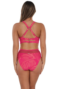 Back pose #1 of Taylor wearing Sunsets Blushing Palms Sandbar Rib Danica Top showing crossback straps