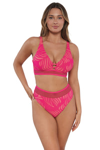 Active pose #1 of Taylor wearing Sunsets Blushing Palms Sandbar Rib Annie High Waist Bottom paired with matching