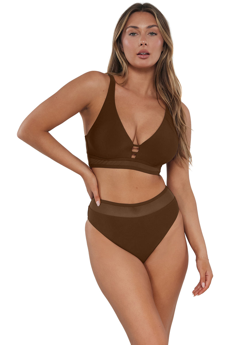 Active pose #1 of Taylor wearing Sunsets Tiki Brown Danica Top