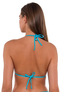 Back pose #2 of Daria wearing Sunsets Blue Bliss Laney Triangle Top
