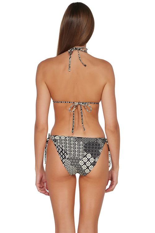 Back pose #1 of Daria wearing Sunsets Venice Seagrass Texture Everlee Tie Side Bottom