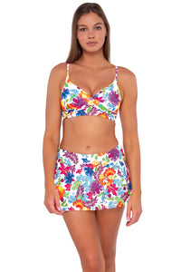 Front pose #1 of Daria wearing Sunsets Camilla Flora Sporty Swim Skirt with matching Lyla Bralette bikini top