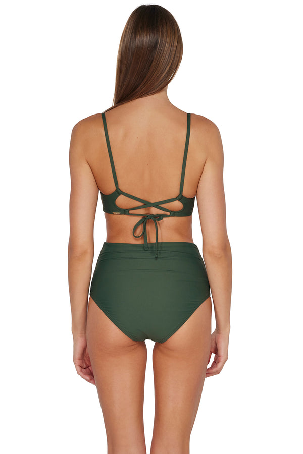 Back pose #1 of Daria wearing Sunsets Island Green Capri High Waist Bottom paired with matching Lyla Bralette Top