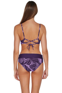 Back pose #1 of Daria wearing Sunsets Mystic Palms Lyla Bralette Top paired with matching Capri High Waist Bottom