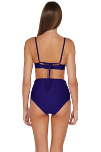 Back pose #1 of Daria wearing Sunsets Indigo Brooke U-Wire Top