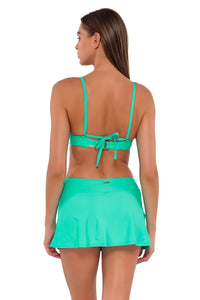 Back pose #1 of Daria wearing Sunsets Mint Sporty Swim Skirt with matching Brooke U-Wire bikini top