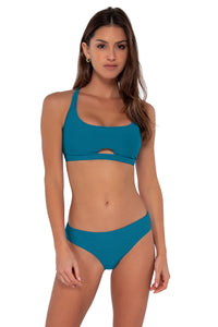 Front pose #1 of Gigi wearing Sunsets Avalon Teal Brandi Bralette Top paired with Collins Hipster bikini bottom
