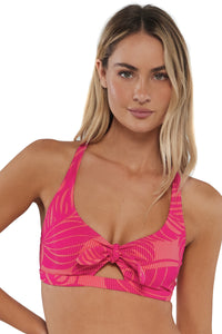 Front pose #1 of Jessica wearing Sunsets Blushing Palms Sandbar Rib Brandi Bralette Top showing keyhole front tie