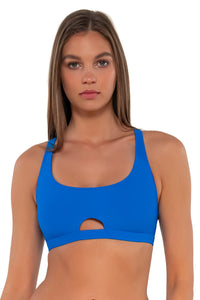 Front pose #1 of Daria wearing Sunsets Electric Blue Brandi Bralette Top